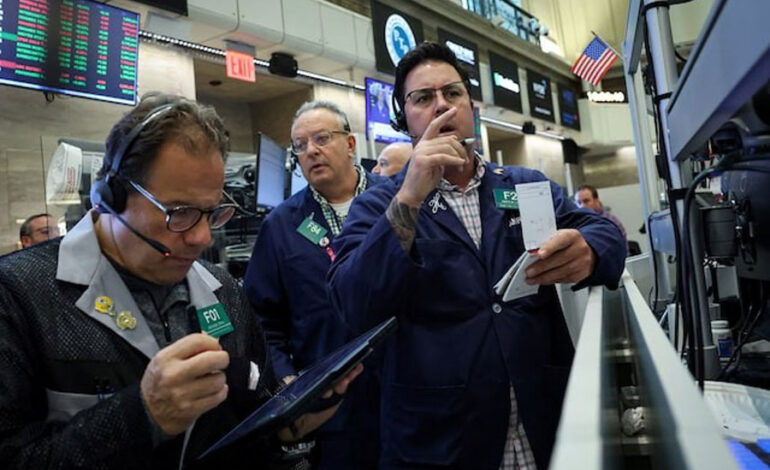 Wall Street futures dip as investors assess earnings, trade risks